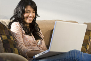 girl studying on laptop