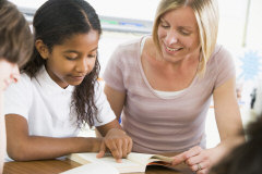 Kid reading a book