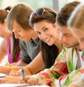 Students taking notes in class