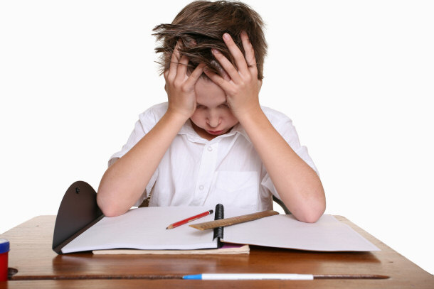 kid struggling with homework