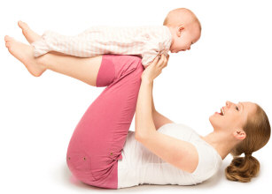 Mother exercising with baby