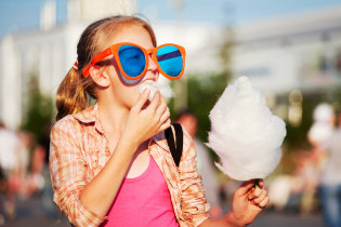 Girl Eating Cotton Candy