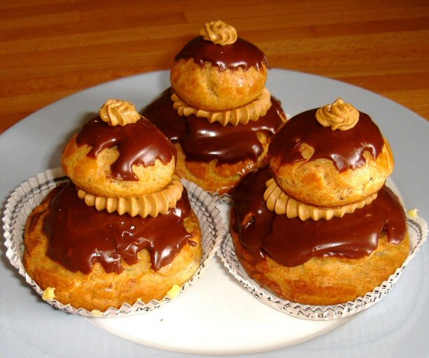 A religieuse is made up of two round clair like parts, where a little one is stuck on top of a larger one.