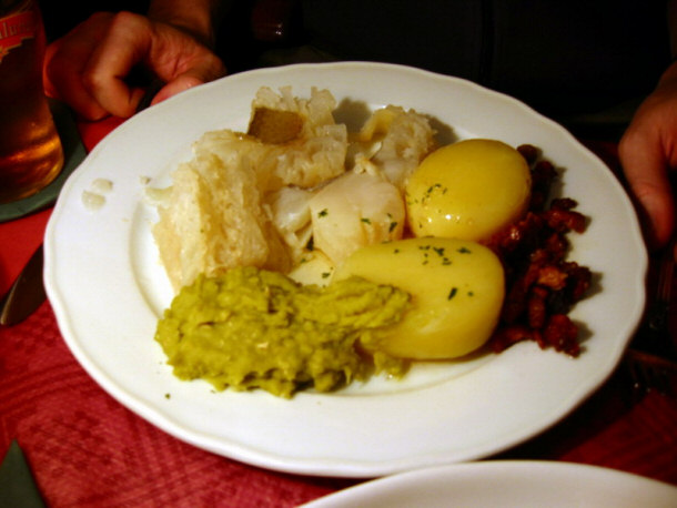 Traditional Norwegian Lutefisk with Potato, Bacon and Mashed Peas: