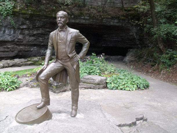 Jack Daniels Statue in front of Subterranean Fresh Water Spring at Lynchburg Distillery