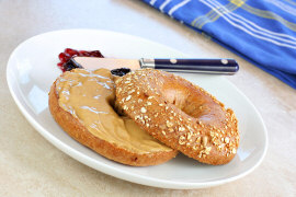 healthy almond butter and jelly bagel