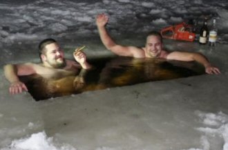 two men in ice hole