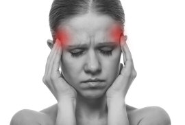 Woman having a migraine