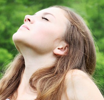 Woman breathing deeply