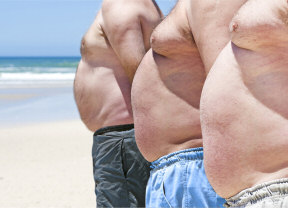 Obese fat men on the beach