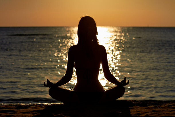 woman posing doing meditation