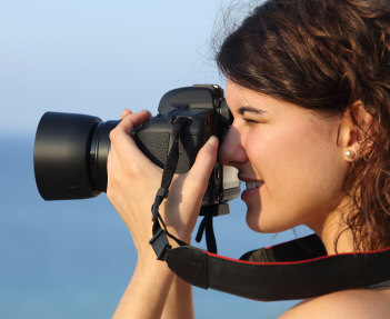woman taking a photo photography
