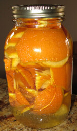 Oranges in jar to make your own orange cleaner