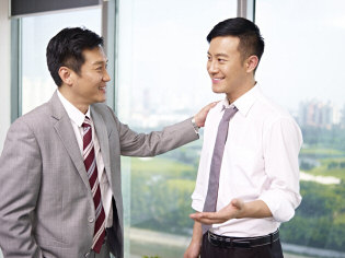 businessmen in conversation building rapport