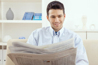 Reading newspaper