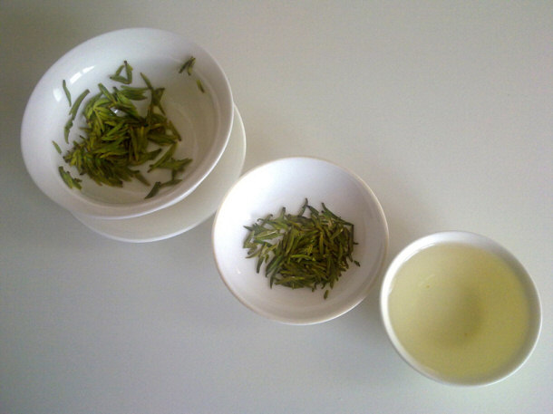 Green Tea (from left to right) Infused Leaves, Dry Leaves, and Green Tea Liquor