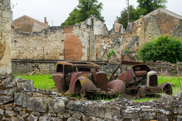 Destroyed Cars Among the Ruins of Oradour-sur-Glane, France