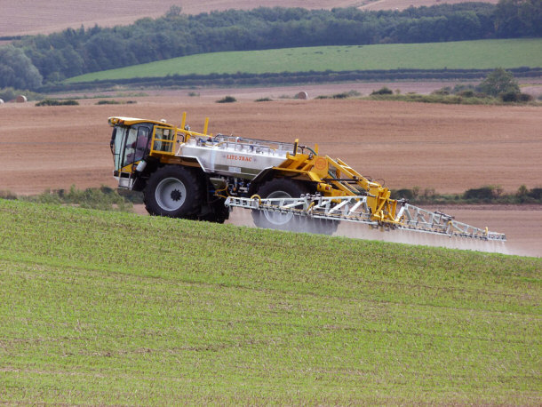 Lite-Trac Crop Sprayer Applying Pesticides to Crops