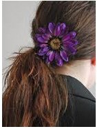 Wear flower clip in the back of your hair