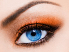 Blue eyes with orange makeup