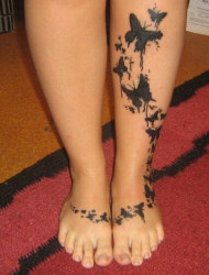Butterfly Tattoo on legs and feet
