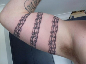 Chain tattoo on biceps
