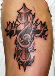 Cross Tattoo on shoulder