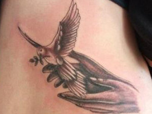 Dove Tattoo on chest
