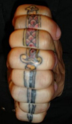 Sword Tattoo across fingers