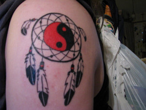 Yin Yang Tattoo on shoulder