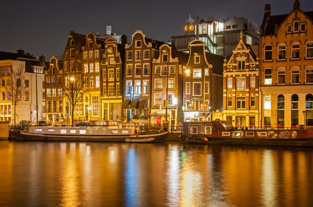 amsterdam lit up at night