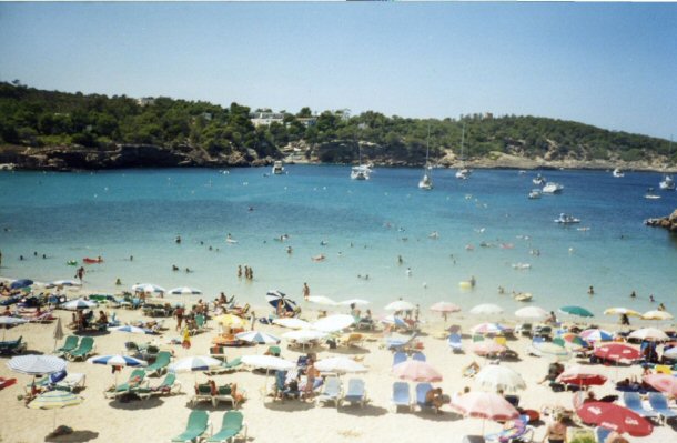 Beach at Portinatx, Ibiza by Ben Sutherland, on Flickr Ibiza has beaches where people can parasail, boat or just relax in the sun.