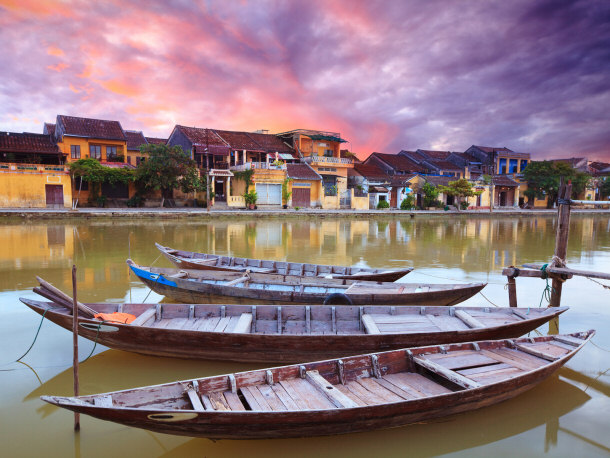 Hoi An Vietnam sunset traditional canoes