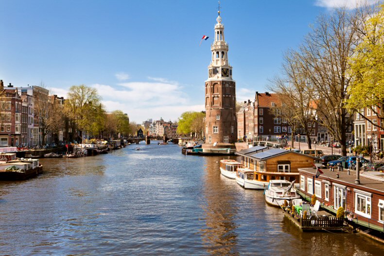 Amsterdam, Neitherlands  is one of the most beautiful cities in Europe and is famous for its artistic design and strikingly elegant architectural works