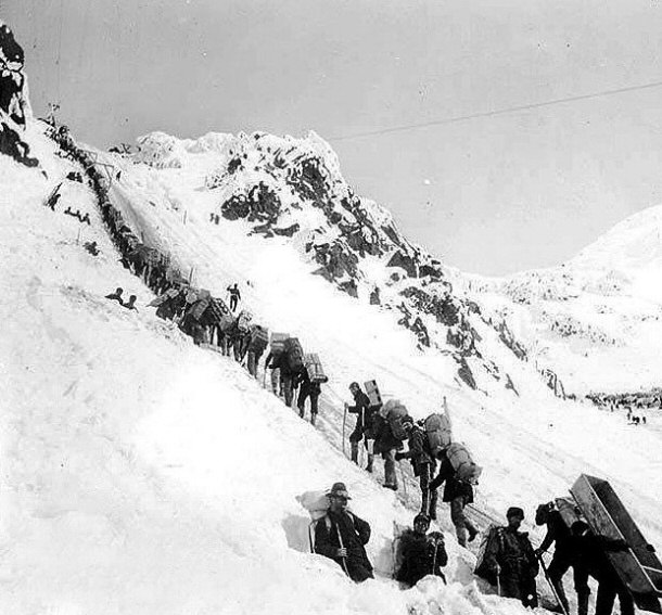 Klondikers Carrying Supplies Ascending the Chilkoot Pass in 1898
