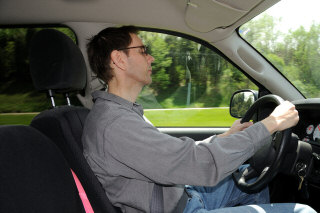 Tired behind the wheel of a car