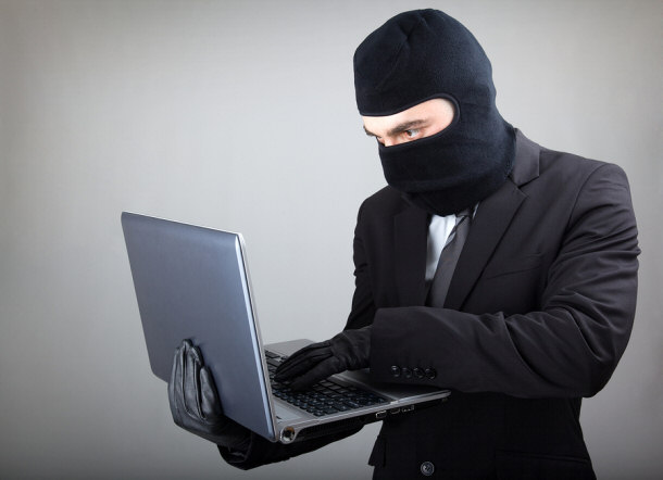 Computer hacker in suit and tie