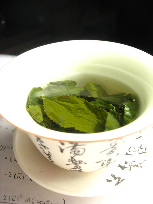 Oolong Tea LEaves Steeping in a Zhong (type of tea cup)