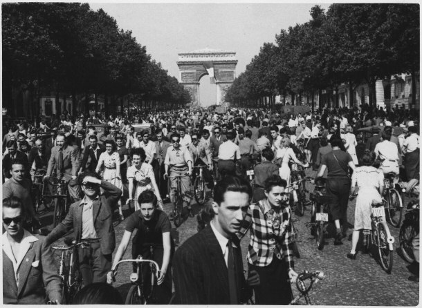 "Hour of Triumph: Parisians Join the Parade Following Allied Victory over Nazis - August 1944