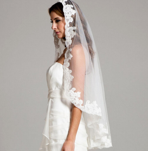 Bride Wearing Mantilla Style Veil: