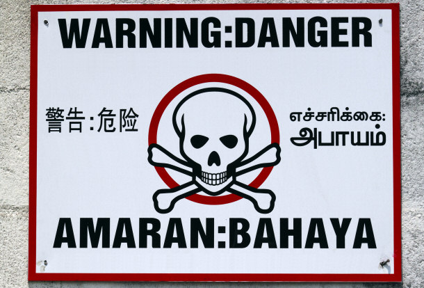warning in four languages