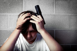 teen depression concept of a dismal society from too many guns and violence