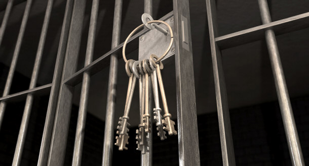 Jail keys opening cell door